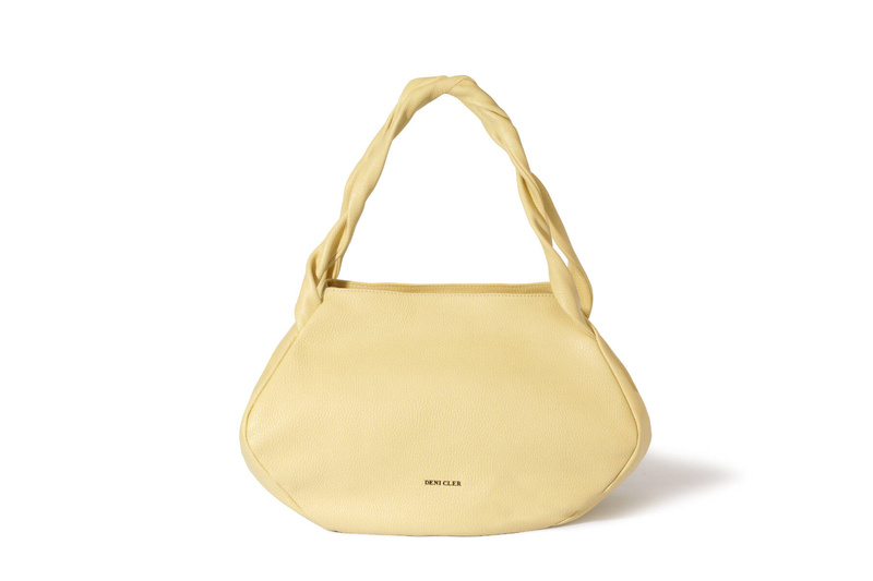 Żółty worek z pokręconą rączką